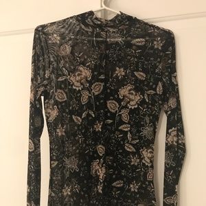 Sheer black turtle neck top